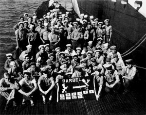 Crew of USS Barbel sport 10-kill battle flag following third war patrol - October 1944.