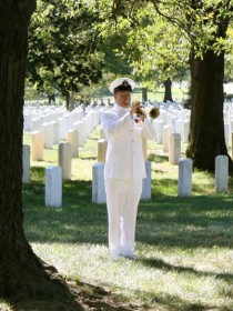 TAPS sounds at Arlington National Cemetery in honor of John Bogert.