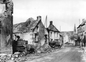 Burned-out and abandoned German armor flanks the streets of Chambois, France following the Allied advance through the Falaise Gap - August 1944. (U.S. Army Signal Corps Photo, Courtesy National Archives)