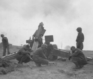At Krebes, Germany, 90th Division Artillery pour 155mm rounds into neighboring Czechoslovakia, softening German positions - April 1945. (U.S. Army Signal Corps Photo, Courtesy National Archives)