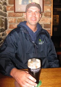 Enjoying a Guinness at O'Connor's Muskerry Arms Pub in Blarney, Ireland.