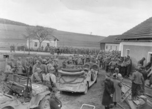 90th Infantry Division soldiers await the surrender of German General Wend Von Wietersheim and his 11th Panzer Division near Vseruby, Czechoslovakia - May 1945. (U.S. Army Signal Corps Photo, Courtesy National Archives)