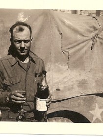 Sonny Dodge, 358th Infantry - 90th Infantry Division, celebrates the end of World War II.