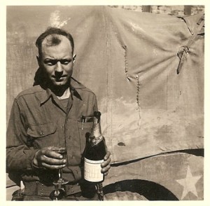 Sonny Dodge, 358th Infantry - 90th Infantry Division, celebrates the end of World War II.
