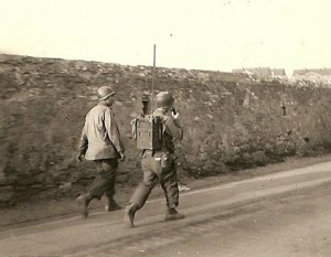 90th Infantry Division sergeant, Hobert Winebrenner, and radioman, Garold Anderson, approach the Rhine River bridgehead - March 1945.